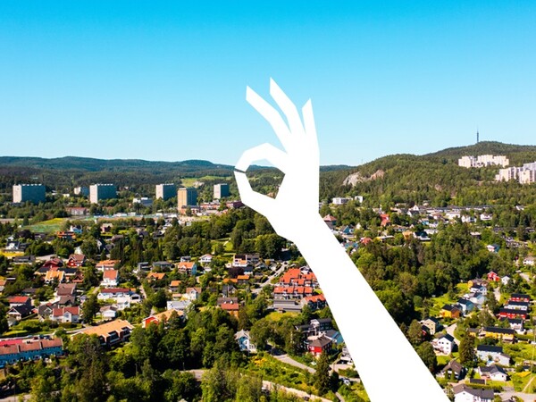 Bilde av Bydel Grorud, med illustrasjon av hånd som rammer inn Huken
